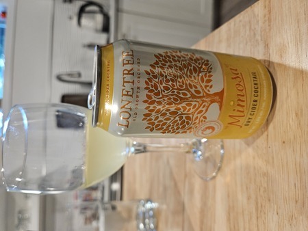 It is a blend so takes a hit for that, but I will grant it does bring the mimosa flavor profile. It says dry on the can but I would call it sweet personally.